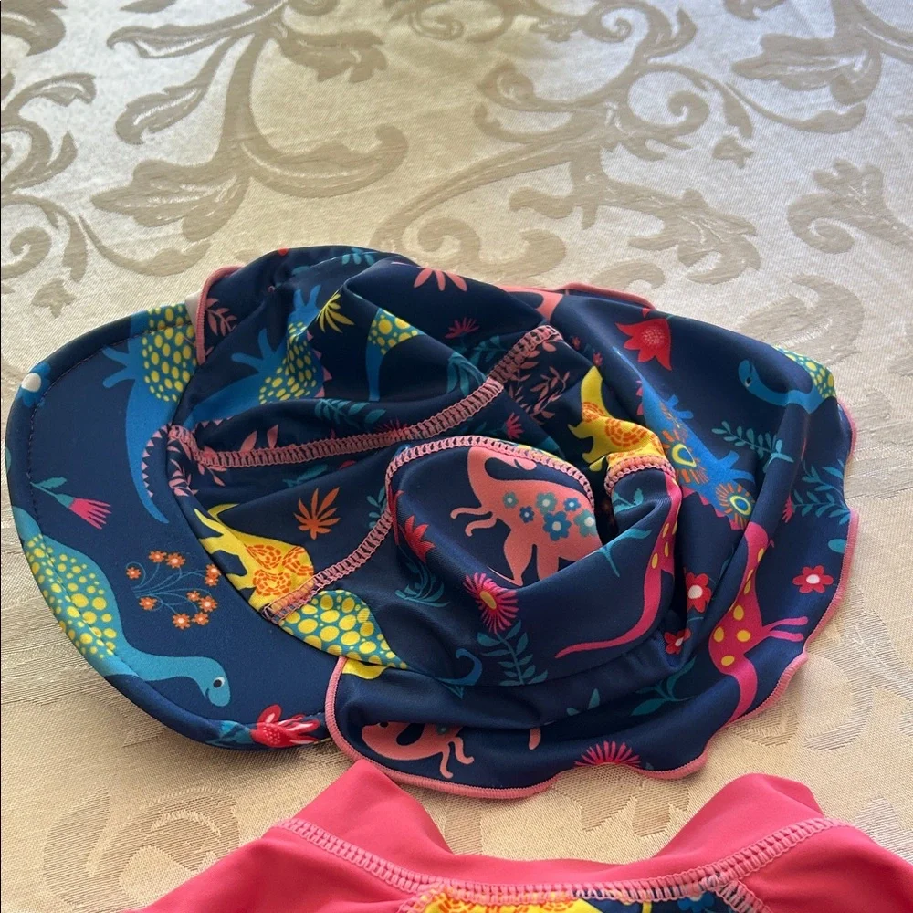 Kids One-Piece Rash Guard Swimsuit in Navy & Pink with Dino Print